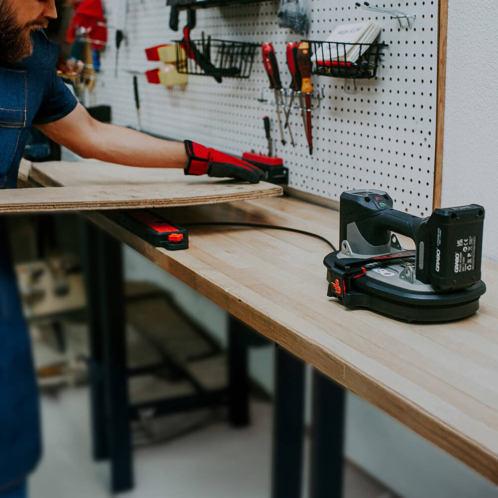 VAC Plate in action lifting wood panel